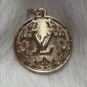 LV Gold-Tone Roman Medallion